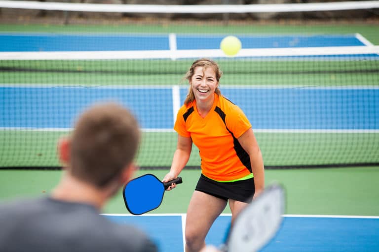 Female Pickleball player Metro Continuing Education
