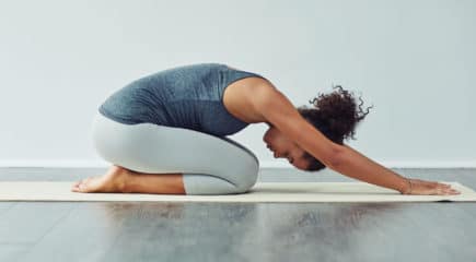 young woman practicing yoga