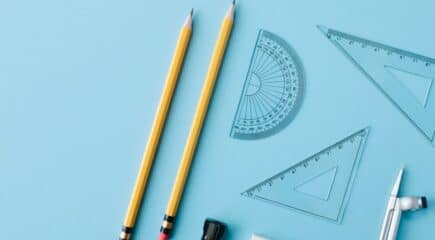 math-supplies-on-blue-surface