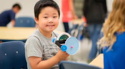 boy learning craft